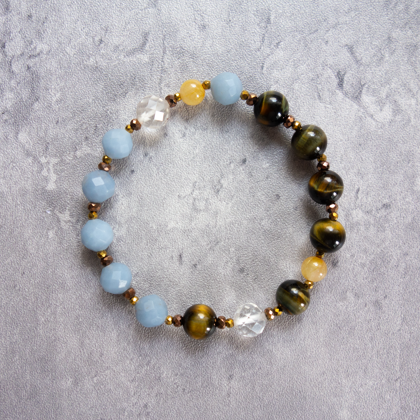 明るいトーンの黄金色と個性美 <タイガーアイ> 着実に変わるための精神力をサポート